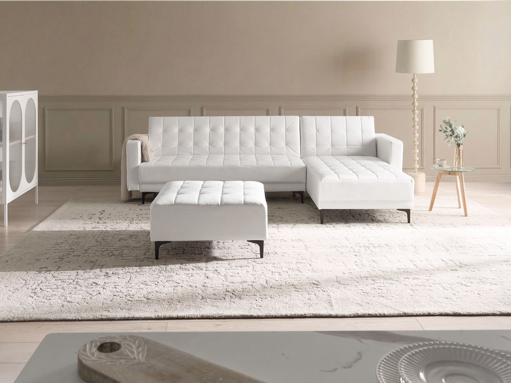 Divano letto angolare in ecopelle bianco versione sinistra con ottomana stile Moderno a L Modulare