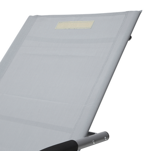 Lettino a dondolo con guide in acciaio grigio imbracatura in tessuto con cuscino per la testa