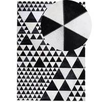 Tappeto in pelle di colore Bianco e Nero Pelle 140 x 200 cm Artigianale stile Moderno