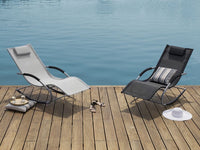 Lettino a dondolo in tessuto con guide in acciaio Nero con cuscino per la testa