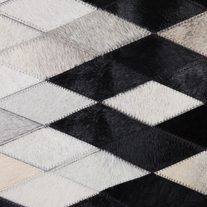 Tappeto Bianco e Nero in Pelle 140 x 200 cm Moderno Patchwork Fatto a Mano