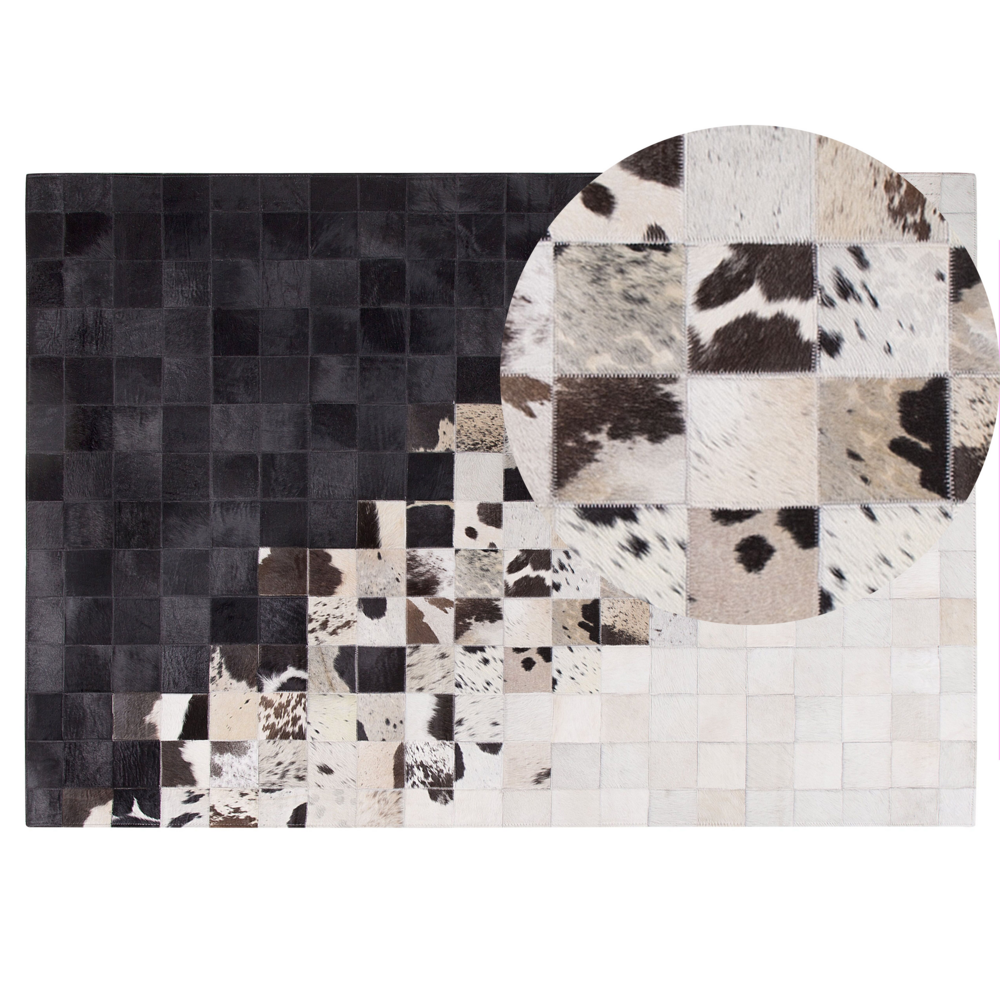 Tappeto Pelle Bianca e Nera 140 x 200 cm Tappeto Rettangolare Moderno Patchwork Fatto a Mano