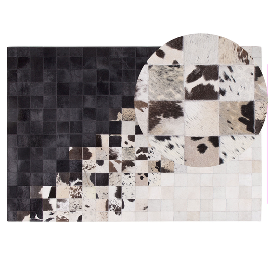 Tappeto Pelle Bianca e Nera 140 x 200 cm Tappeto Rettangolare Moderno Patchwork Fatto a Mano