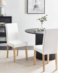 Set di 2 sedie da pranzo bianche con gambe in legno ecopelle moderne