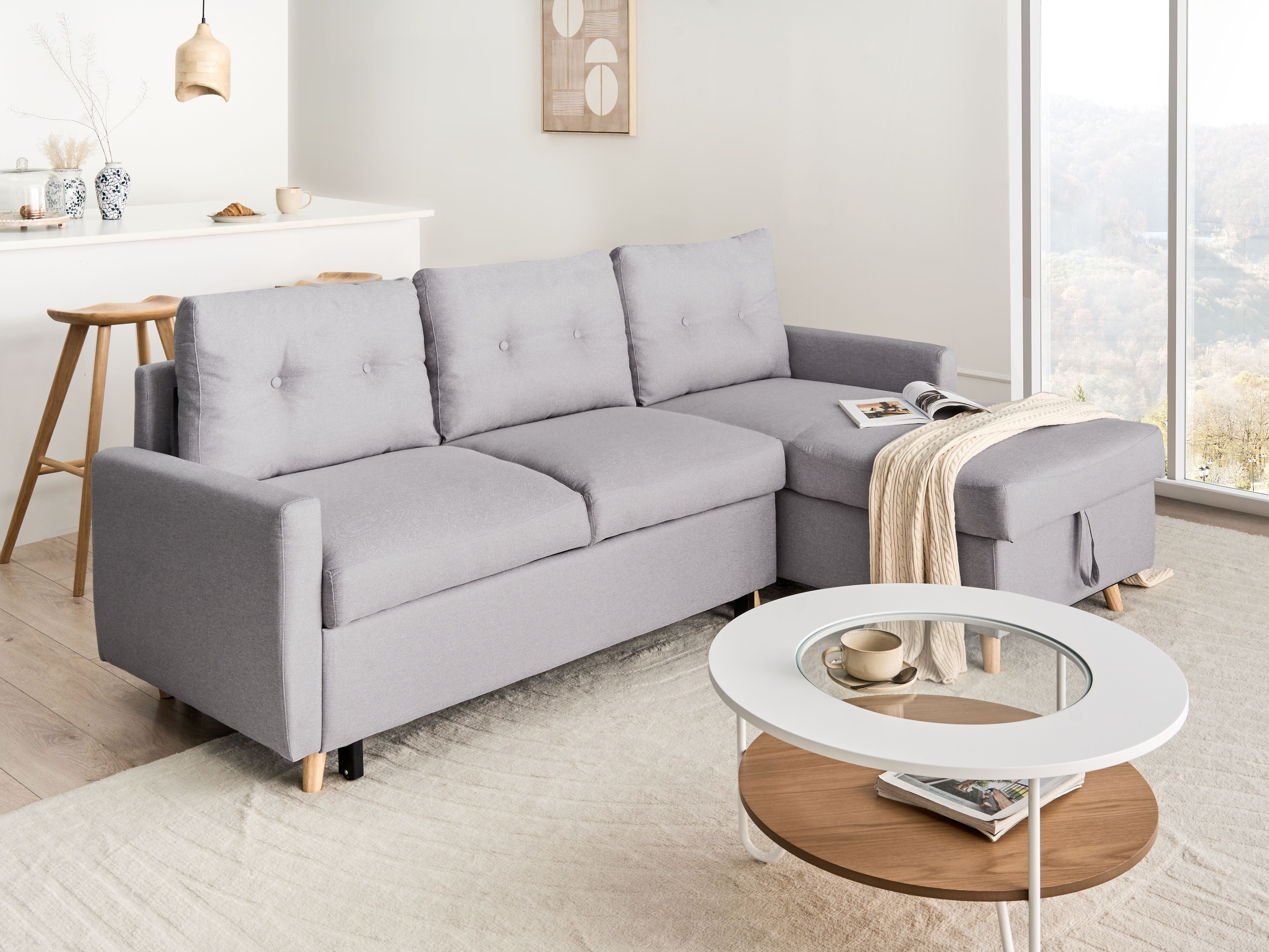 Divano letto angolare in tessuto grigio chiaro 4 posti contenitore a forma di L Orientamento a versione sinistra