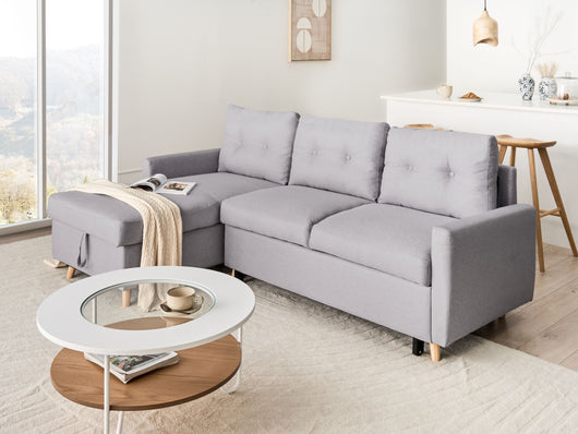 Divano letto ad angolo in tessuto grigio chiaro 4 posti contenitore a forma di L con orientamento a versione destra