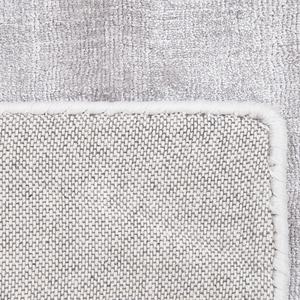 Tappeto in viscosa grigio chiaro 80 x 150 cm a pelo corto capitonné moderno