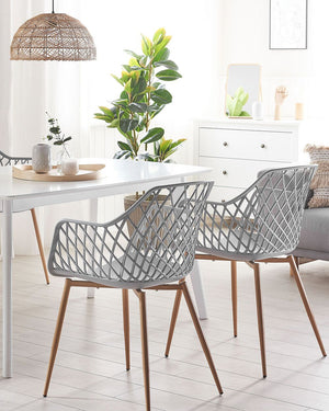 Set di 2 sedie da pranzo grigio sintetico sedile in legno chiaro gambe in metallo aperto netto indietro moderno soggiorno stile scandinavo