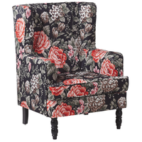 Poltrona con poggiapiedi in tessuto Nero motivo floreale gambe in legno stile Wingback