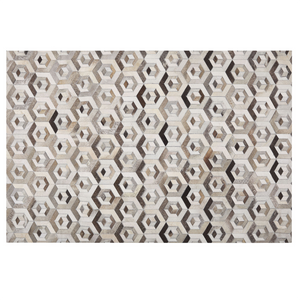 Tappeto rettangolare in pelle di vacchetta beige e marrone 140 x 200 cm Patchwork motivo geometrico retrò