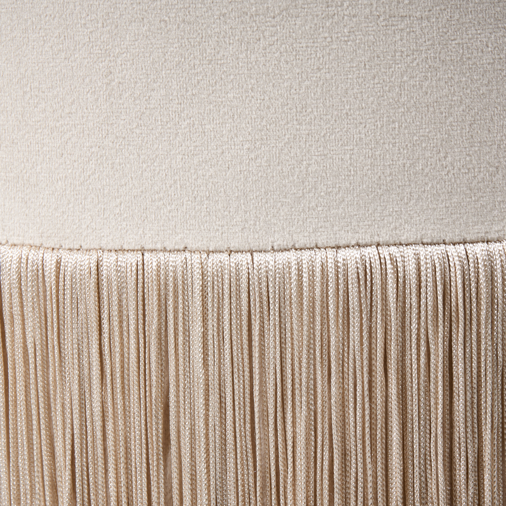 Pouf ottomana rotondo in velluto beige con pouf Glam con nappe