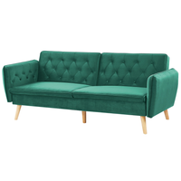 Divano letto trasformabile imbottito in velluto verde scuro con schienale abbottonato dal design moderno