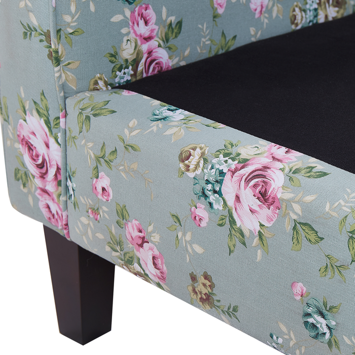 Poltrona con poggiapiedi in tessuto motivo floreale verde gambe in legno stile Wingback