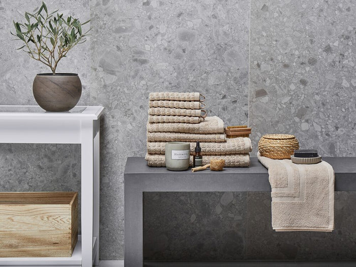 Set di 9 asciugamani da bagno e tappetino da bagno per ospiti in cotone beige