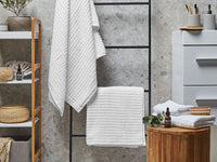 Set di 4 asciugamani da bagno e telo da bagno per ospiti in cotone bianco a bassa torsione