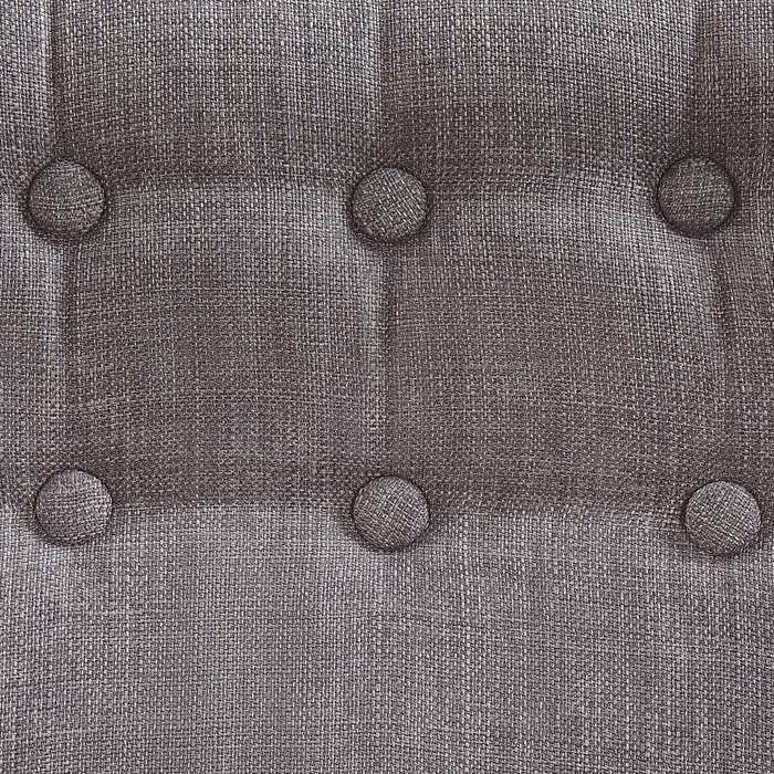 Poltrona in tessuto grigio con rivestimento in tessuto retrò con bottoni in stile retrò