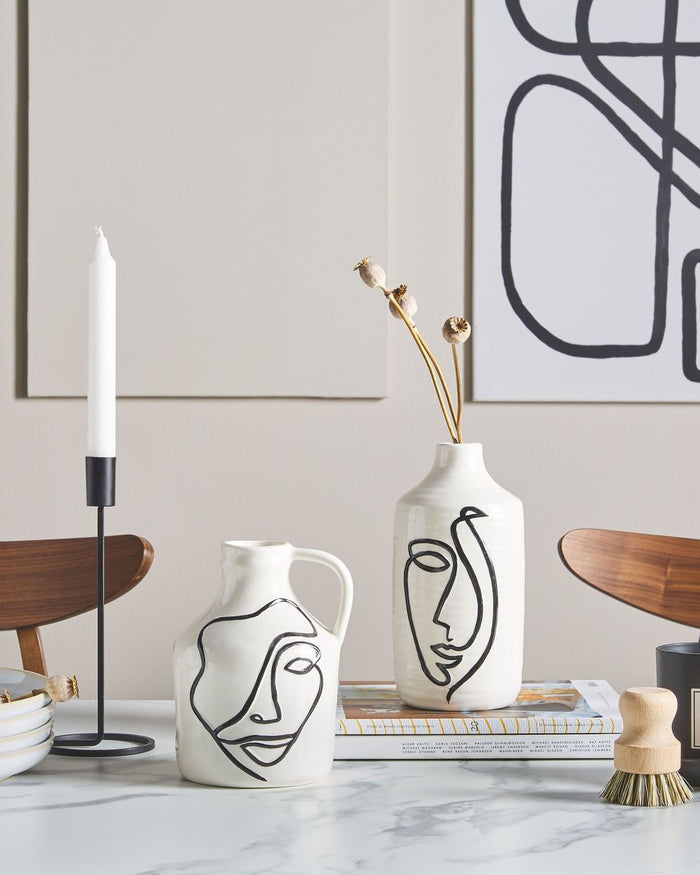 Vaso per fiori in gres porcellanato bianco con motivo viso accessorio decorativo per la casa