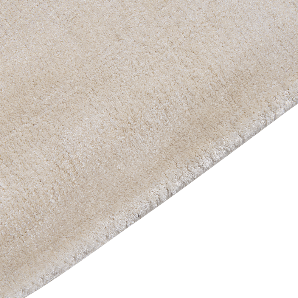 Tappeto in viscosa beige chiaro 80 x 150 cm a pelo corto capitonné moderno