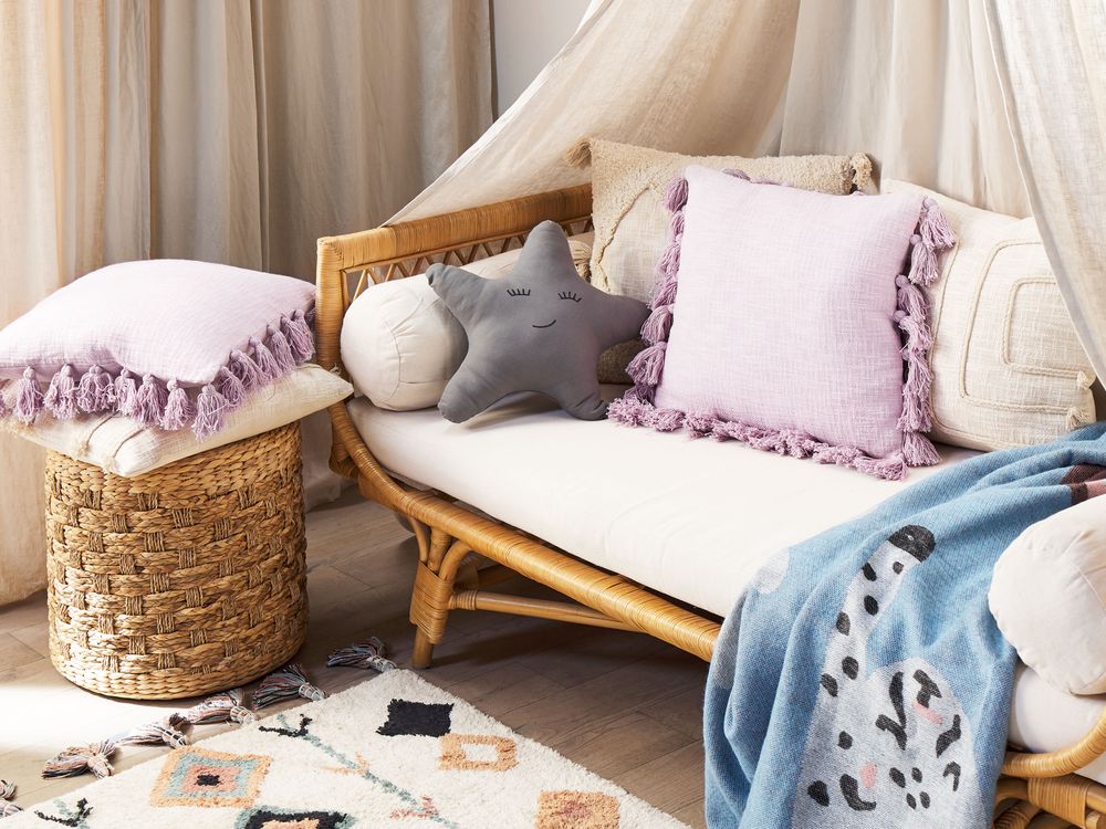 Set di 2 cuscini decorativi cotone rosa 45 x 45 cm con nappe accessori moderni per l'arredamento boho