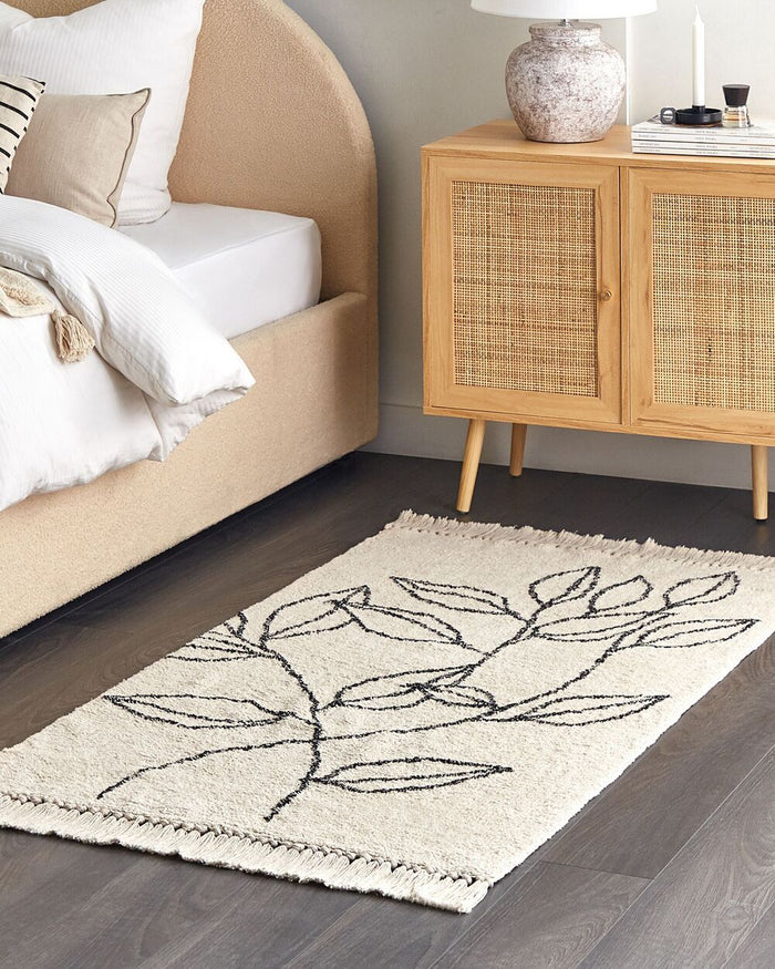 Tappeto cotone trapuntato motivo a foglie e nappe 80 x 150 cm beige e nero soggiorno camera da letto