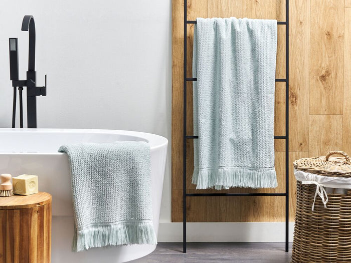 Set di 2 asciugamani bagno in spugna di cotone verde menta con nappe decorative