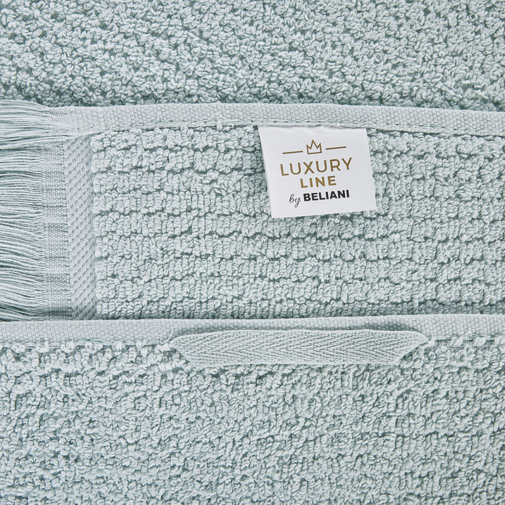 Set di 2 asciugamani bagno in spugna di cotone verde menta con nappe decorative