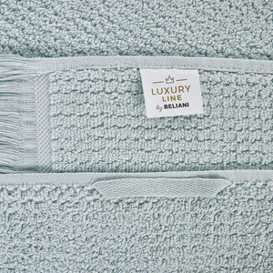 Set di 2 asciugamani bagno in spugna di cotone verde menta con nappe decorative