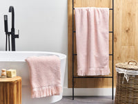 Set di 2 asciugamani bagno in spugna di cotone rosa pastello con nappe decorative