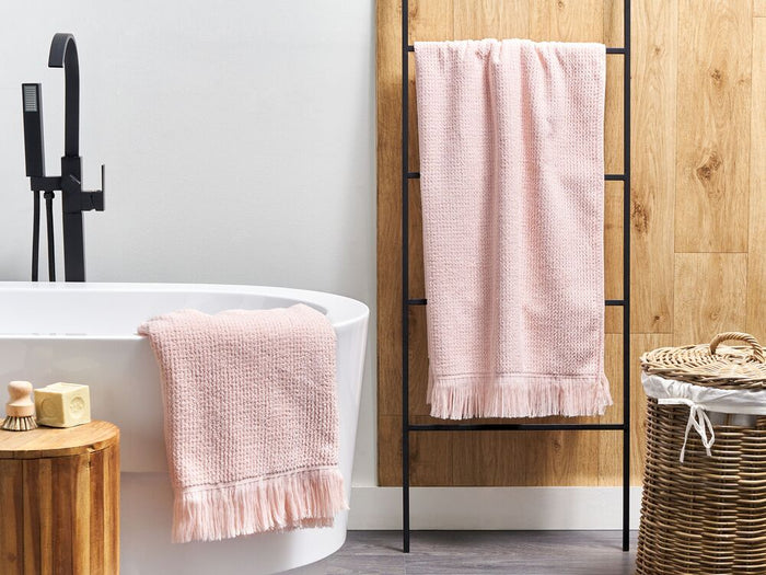 Set di 2 asciugamani bagno in spugna di cotone rosa pastello con nappe decorative