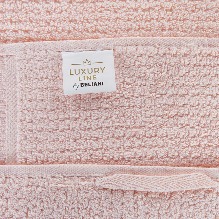 Set di 2 asciugamani bagno in spugna di cotone rosa pastello con nappe decorative