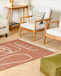 Tappeto rettangolare per interni e per esterni in poliestere con motivo a nappe rosso chiaro 140 x 200 cm stile boho