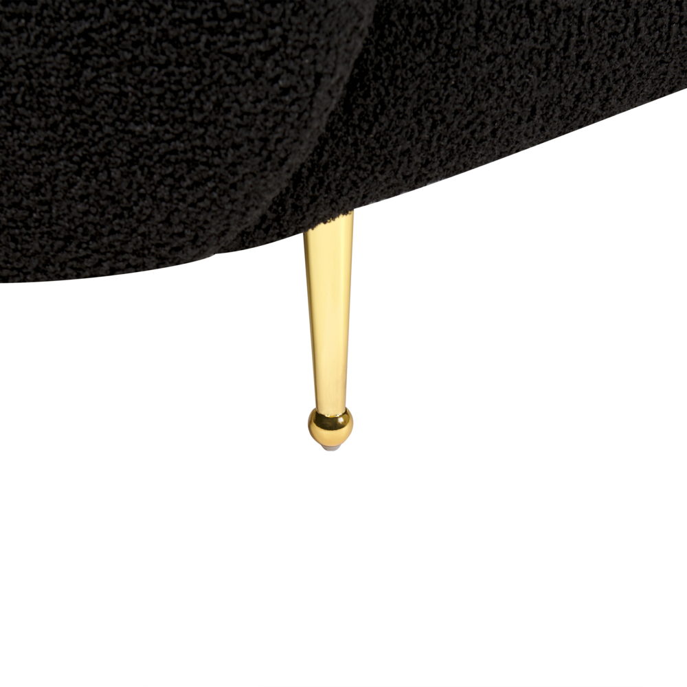 Poltrona morbida in poliestere di colore nero con gambe dorate stile glamour retrò soggiorno