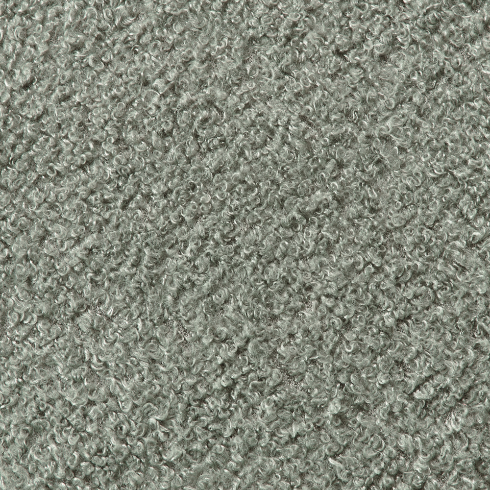 Poltrona da salotto con schienale curvo boucle verde stile glam elegante soggiorno