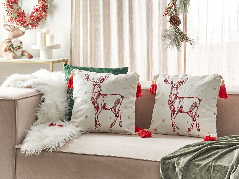 Set di 2 cuscini decorativi in cotone bianco rosso 45 x 45 cm Motivo natalizio Stampa renne Nappe Accessori Decorazione festiva