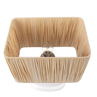 Lampada da tavolo in ceramica bianca con paralume a tamburo in lino  base minimalista design stile contemporaneo