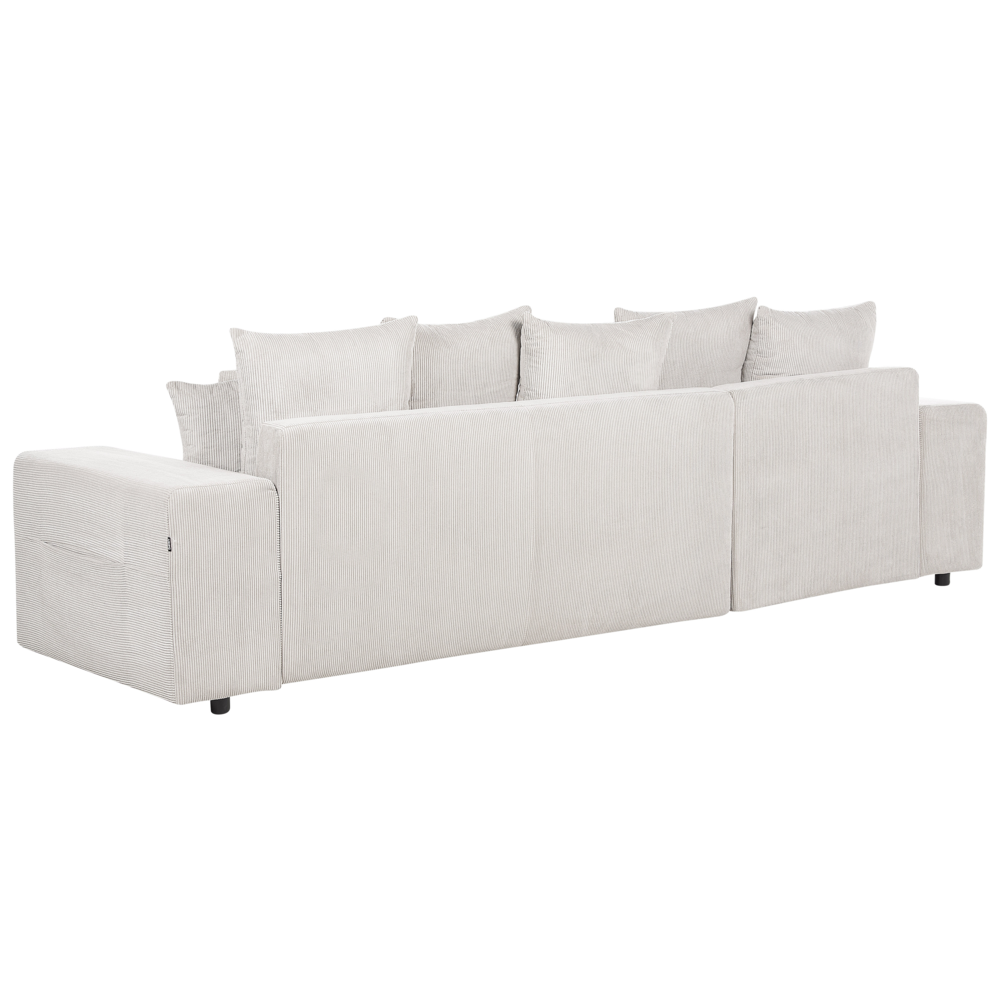 Divano angolare a destra in velluto a coste beige chiaro a 3 posti con cuscini extra sparsi Soggiorno moderno