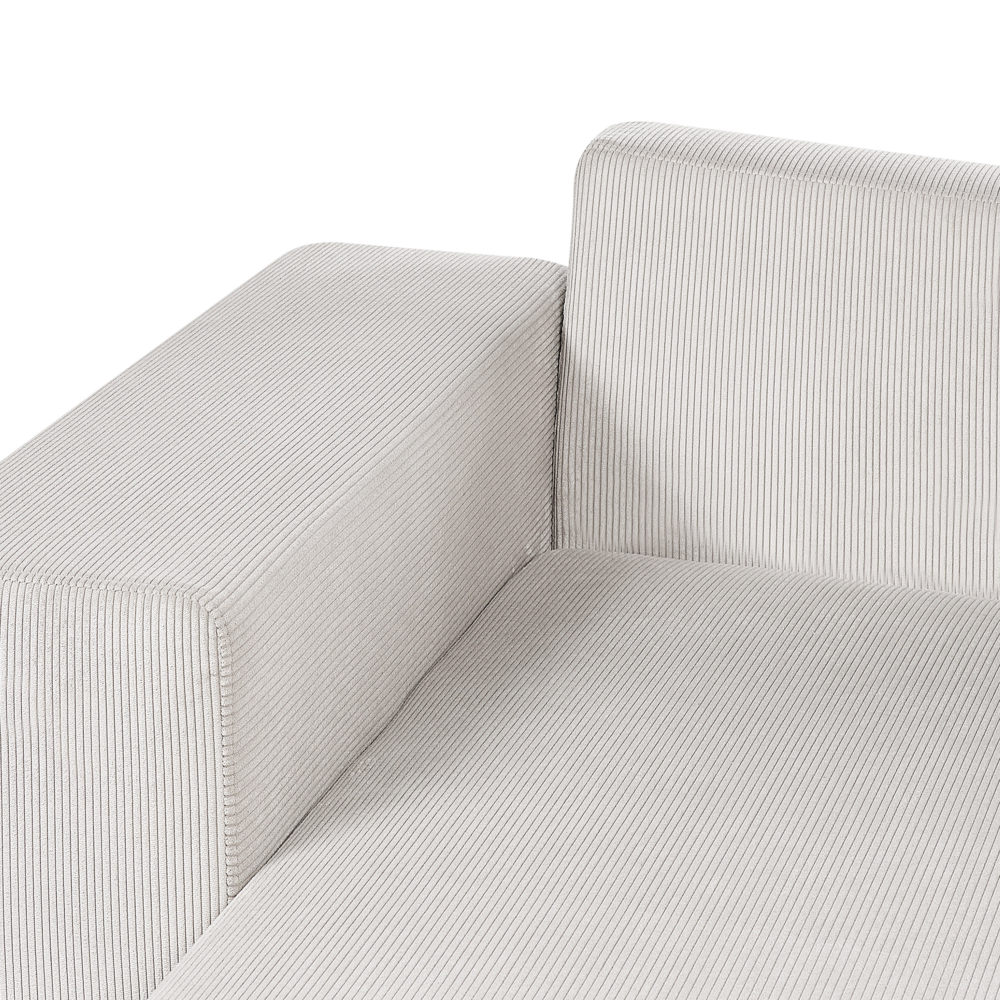 Divano angolare a destra in velluto a coste beige chiaro a 3 posti con cuscini extra sparsi Soggiorno moderno