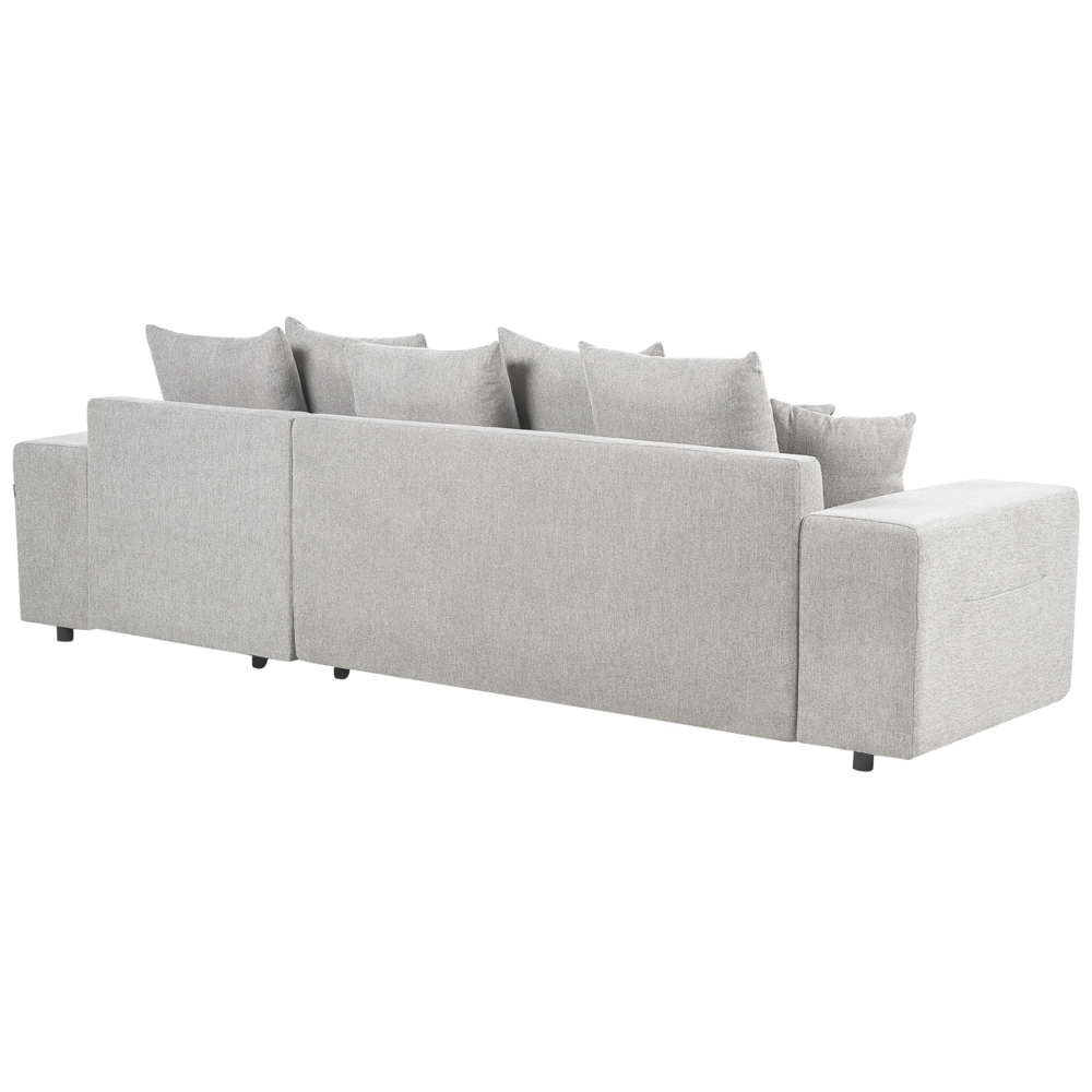 Divano angolare a sinistra in tessuto grigio chiaro a 3 posti con cuscini extra sparsi Soggiorno moderno