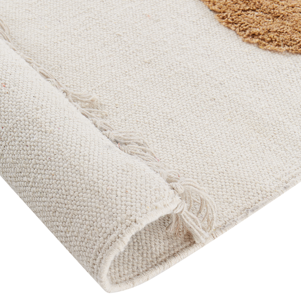 Tappeto per bambini in cotone beige 140 x 200 cm con motivo di dinosauro animale e nappe, tessuto a mano.