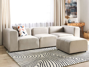 Divano componibile a 3 posti con pouf rivestito con velluto beige stile moderno