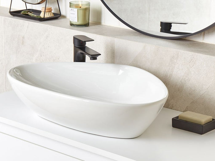 Lavabo da appoggio in ceramica bianca lucida 600 x 390 mm Lavello da bagno di forma irregolare