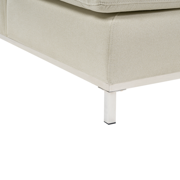 Divano ad angolo rivestito in tessuto beige con ottomana a forma di L con orientamento a versione destra