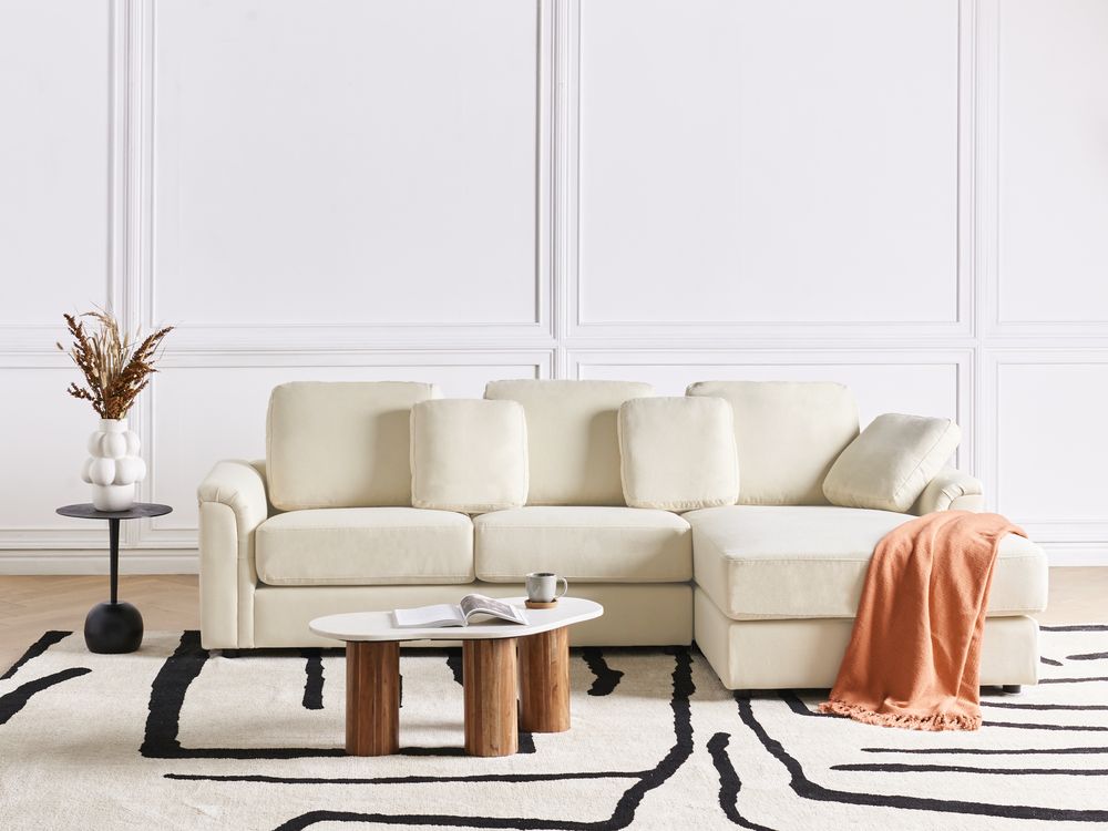 Divano moderno ad angolo con gambe in plastica in tessuto beige chiaro lato sinistro