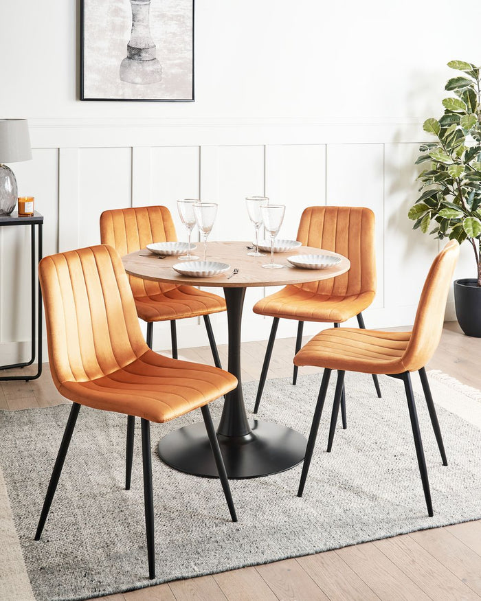 Set di 4 sedie da pranzo in velluto arancione Gambe in ferro stile moderno