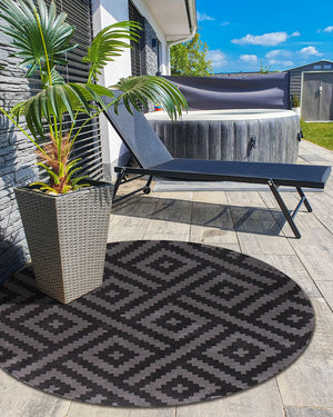 Tappeto rotondo per interni e per esterni con motivo geometrico ⌀ 160 cm nero e grigio stile moderno balcone patio