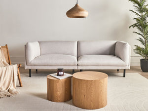 Divano a 3 posti imbottito in tessuto beige chiaro legno gambe nere imbottito da salotto