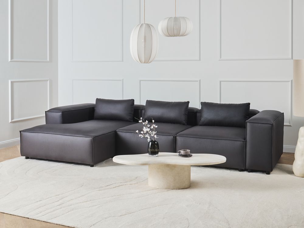 Divano modulare a 4 posti a sinistra in ecopelle nera lato destro stile moderno