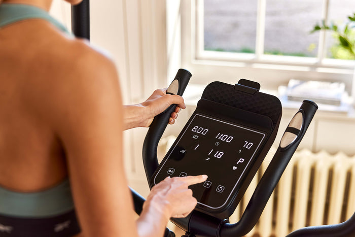 Vélo de fitness Elliptique Ergomètre - Maison/Appartement - Reebok - Modèle FR30 - Roue d'interie 9 KG - Ecran LED