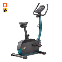 Vélo de Fitness Ergomètre - Reebok - Maison/Appartement - Modèle FR30 - Roue d'inertie 9 KG - Ecran tactile LED