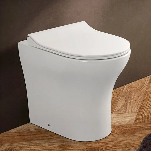 Wc filomuro senza brida bianco lucido con scarico universale  Itaca